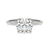 ROUND BRILLIANT SIGNATURE PETITE SIDE-STONE ENGAGEMENT RING