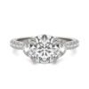 ROUND BRILLIANT LUMINA THREE-STONE ENGAGEMENT RING
