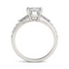 OVAL TAPERED BAGUETTE ACCENTED THREE-STONE ENGAGEMENT RING