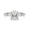 OVAL TAPERED BAGUETTE ACCENTED THREE-STONE ENGAGEMENT RING