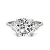 CUSHION CLAW PRONG TRILLION THREE-STONE ENGAGEMENT RING